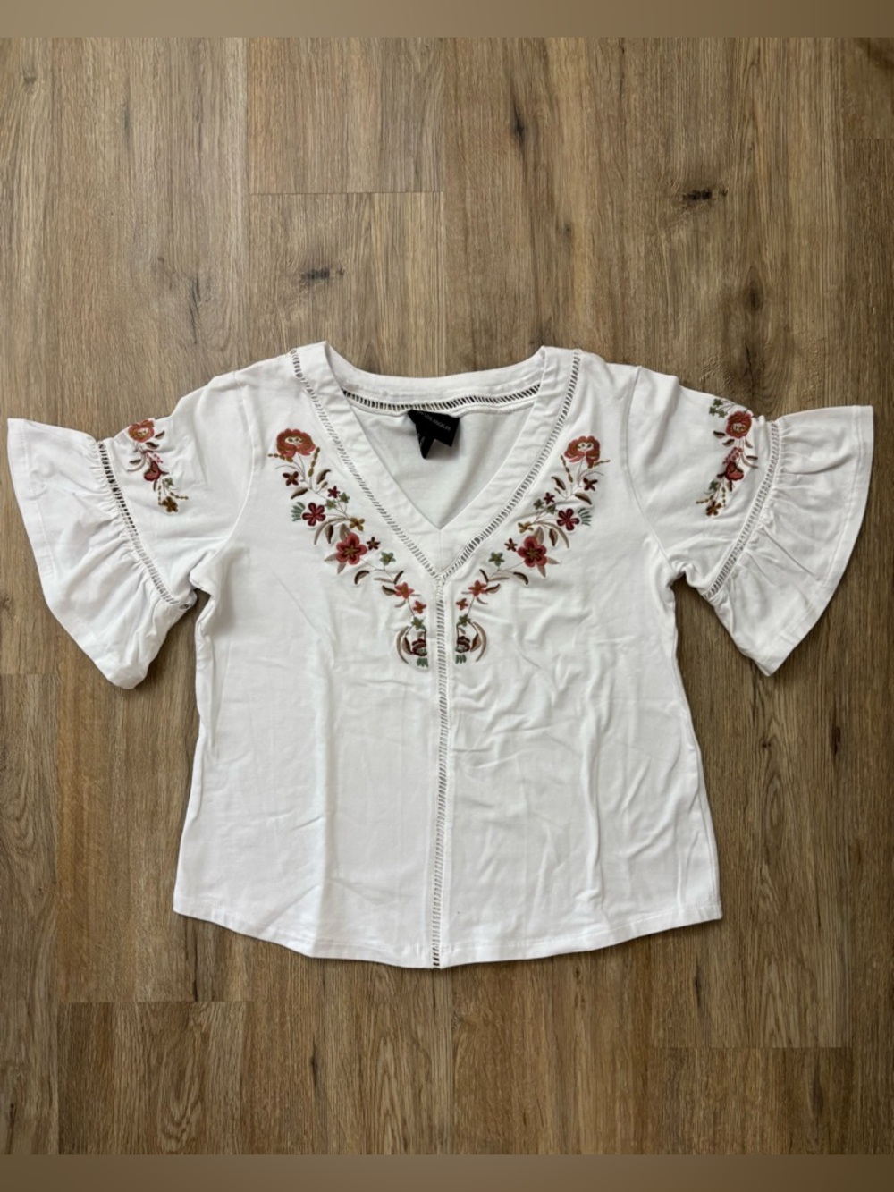 Liv Los Angeles Embroidered V-Neck Blouse in White with Floral Accents